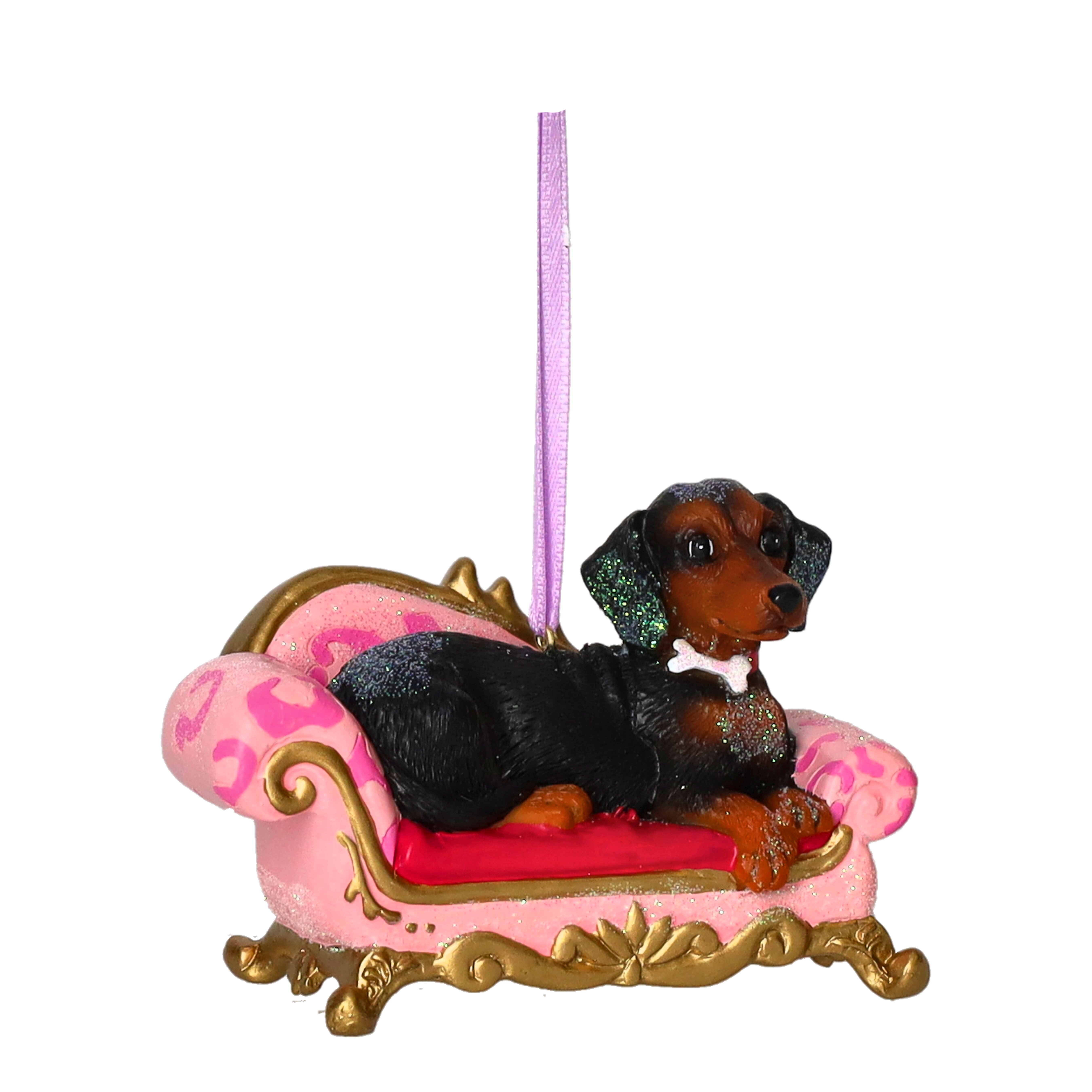 Hänger Dackel auf Sofa